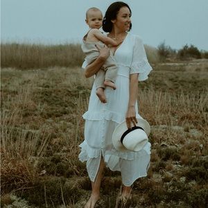 White maxi dress with buttons down front and loose sleeves beautiful detail